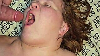 dirty milf sucks huge cock between her massive tits!