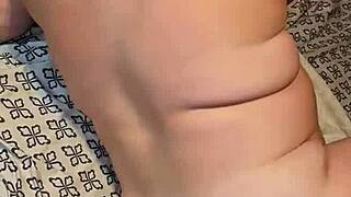 dirty milf sucks huge cock between her massive tits!