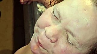 dirty milf sucks huge cock between her massive tits!