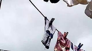 Neighbor milf slips off panties for secret masturbation session