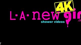 Sun-kissed blonde model strips teases in steamy shower solo