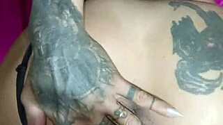 crazy tattooed couple kisses licks and fucks wildly closeup