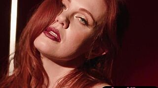 busty redhead milf shakes her huge tits stripping on stage