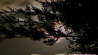 Busty milf teases girlfriend's pussy outdoors