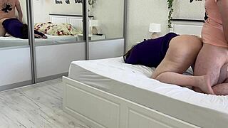 Mature stepmom bares huge tits on bed, jerks stepson cock then takes anal ride