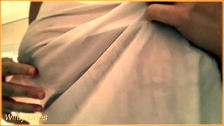 hey check my wife showing off those amazing tits thru her wet braless singlet