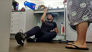 horny wife sneaks handyman bang under the sink