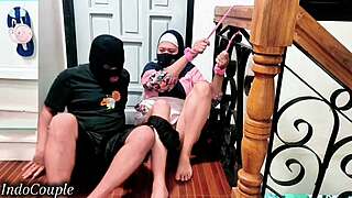 Muslim hijab sister-in-law ties punishes cheating wife at staircase