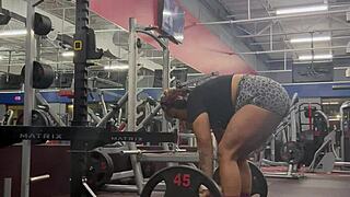 muscle mommy bobbi jo flexes ebony tattoos outdoors pov