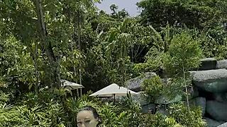 Monika Fox swims poolside in blue bikini paradise