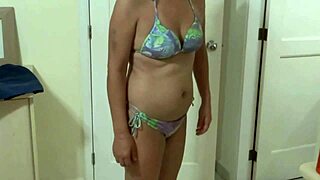 my wife shows off bikini on beach