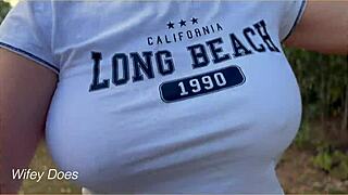 Wifey flashes perfect braless tits in public garage