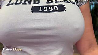 Wifey flashes perfect braless tits in public garage