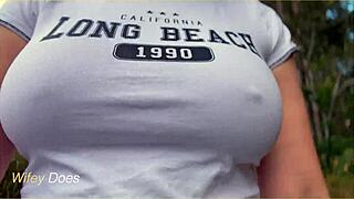 Wifey flashes perfect braless tits in public garage