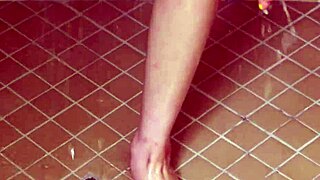 charming brunette model steps into steamy hot shower