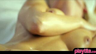 Watch this blonde milf oil up for fingering fun