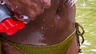 jungle milf in bikini soaping up her ebony ass with bubbles 😍🌿