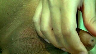 Beautiful Asian tranny fingers ass and deepthroats in fishnets on bed