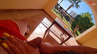 stepmom strokes cock hard on the terrace balcony