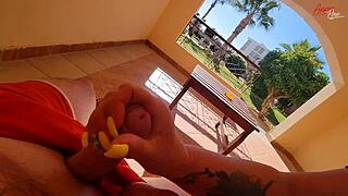 stepmom strokes cock hard on the terrace balcony