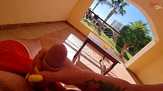 stepmom strokes cock hard on the terrace balcony