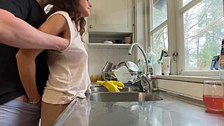 Horny tanned wife bent over kitchen sink takes husband's huge cock doggystyle to screaming orgasm