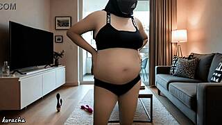 pregnant hijab doctor relaxes alone bored