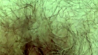 teasing close-up of hairy pussy pulsing to climax