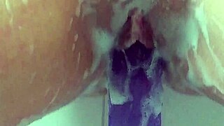 FUCK, I'M THRUSTING MY BIG PURPLE DILDO DEEP IN THE BATH TILL MY PUSSY EXPLODES IN CUM!