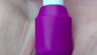 my shaved pussy throbs with magic wand orgasm right in the wet garden