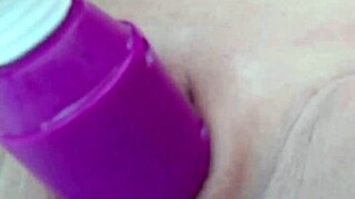 my shaved pussy throbs with magic wand orgasm right in the wet garden