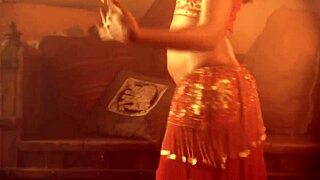 oriental brunette milf dances seductively stripping clothes off