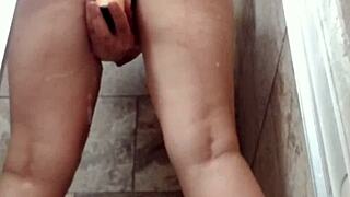 Pregnant blonde milf fucks shower dildo horny and wet