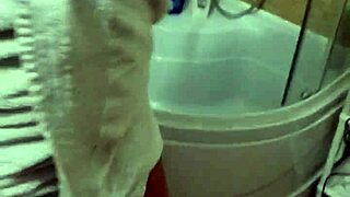 Milf showers shaved pussy natural tits after hard day work