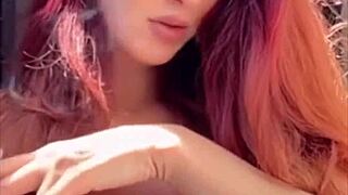 italian milf artemisia love smokes seductively with her huge natural tits