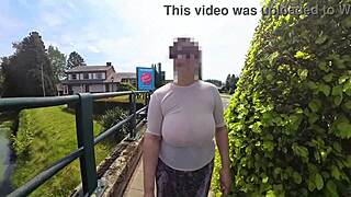 imagine this busty milf braless in see-through top on street?