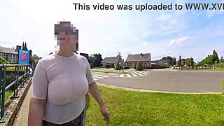 imagine this busty milf braless in see-through top on street?