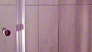 amateur milf fingers herself in shower moaning to orgasm