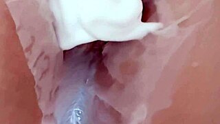 A 20yo virgin's wet shaved pussy glistens close-up as Japanese wife licks and fingers it hungrily