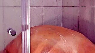 amateur milf fingers herself in shower moaning to orgasm