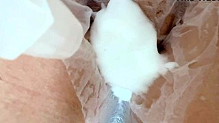 A 20yo virgin's wet shaved pussy glistens close-up as Japanese wife licks and fingers it hungrily