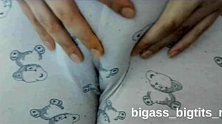 fat milf's cameltoe pussy peeks thru pajamas as she fingers wildly??