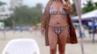 beautiful stepmother flashes on beach for big load