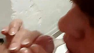 Brunette mature milf gives pov handjob and blowjob