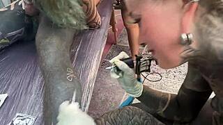 wild tattoo shop moment - tattooing while giving a head