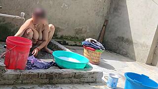 Sexy bhabhi is bathing outside at home