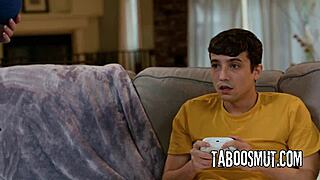 Horny stepmom distract stepson with her natural boobs while playing video games