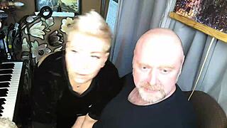 fun of mature married couple on balcony
