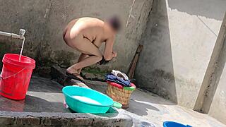 Sexy bhabhi is bathing outside at home