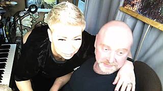 fun of mature married couple on balcony